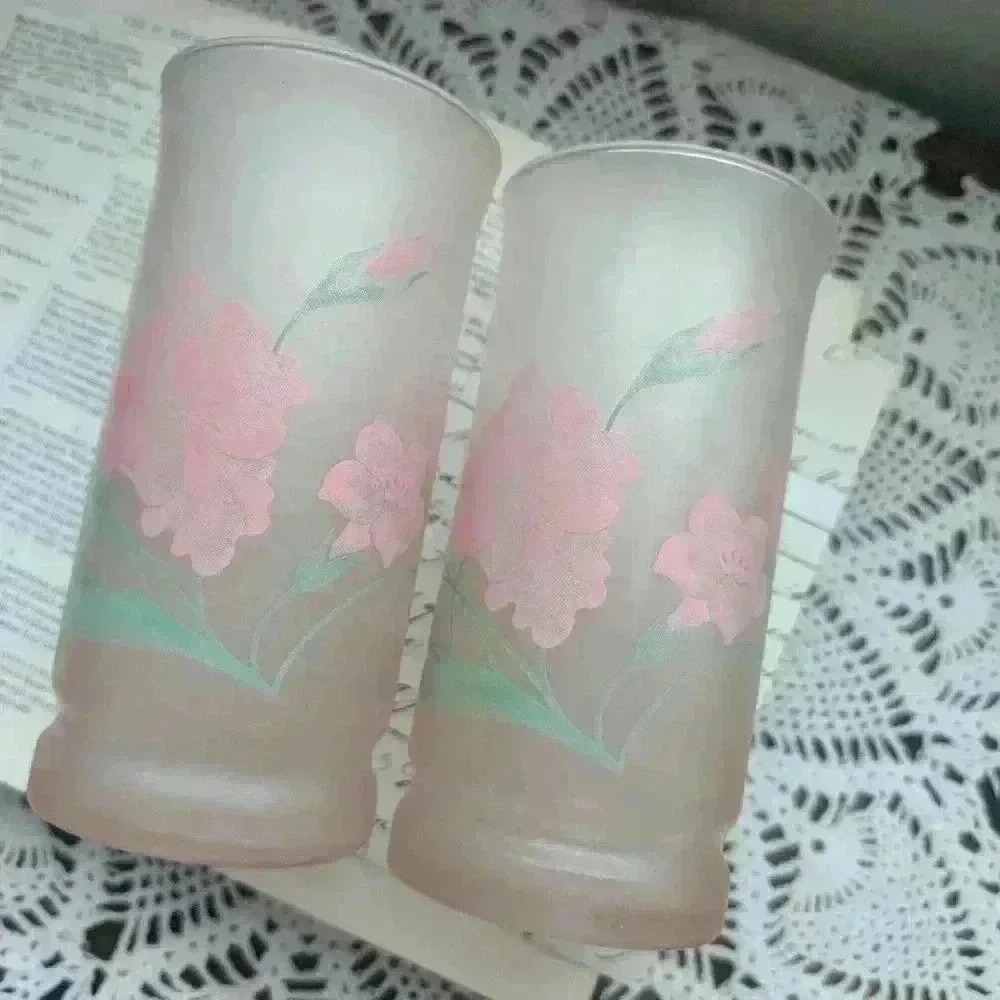 Vintage pair of pink frosted floral tumbler glasses